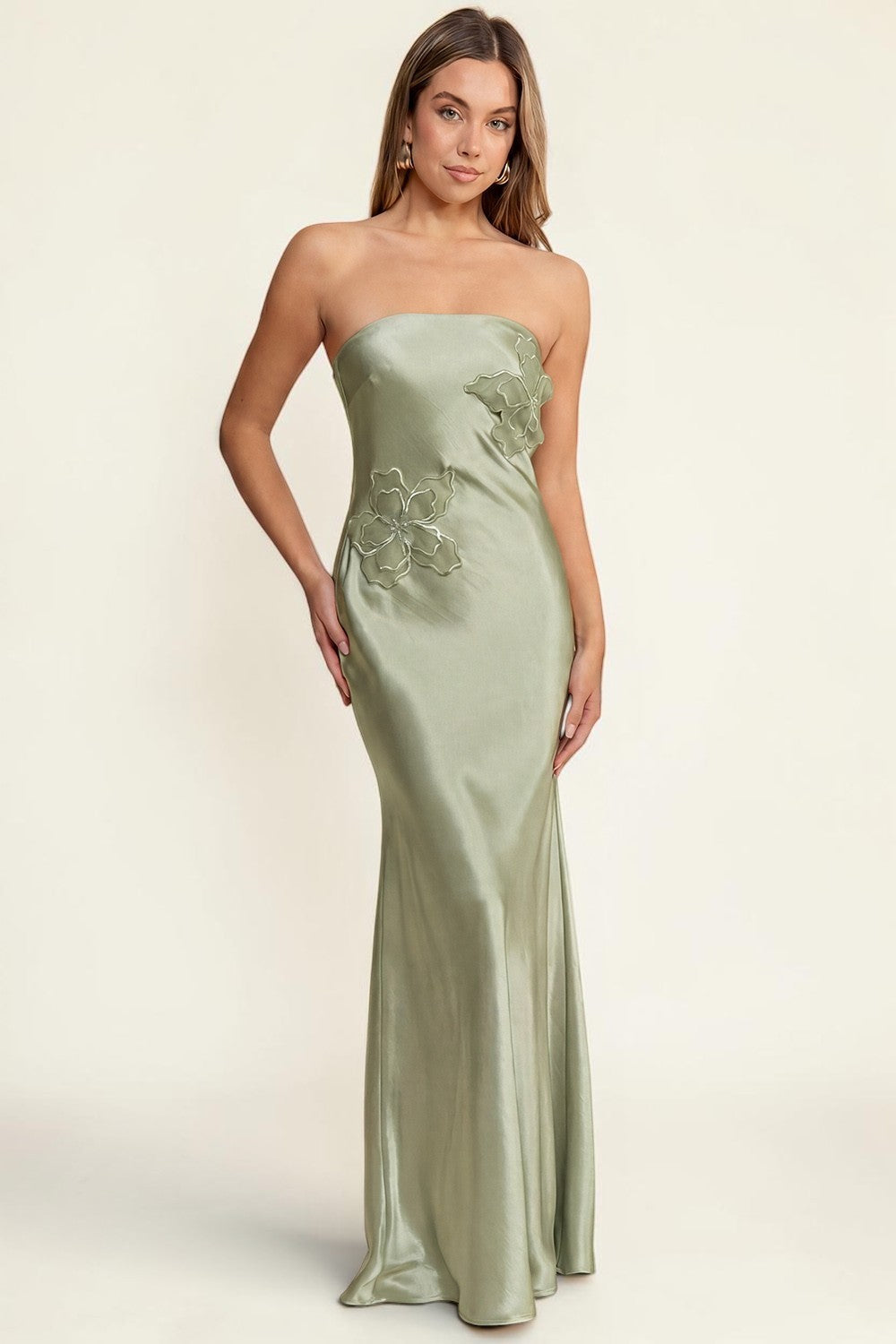Blackandbone sage green strapless maxi dress with floral appliques on bodice, made of satin-like fabric.